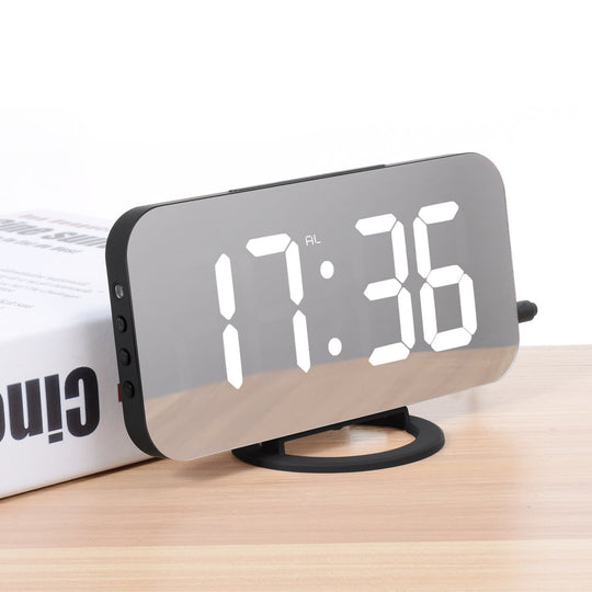 Induction dimming electronic clock